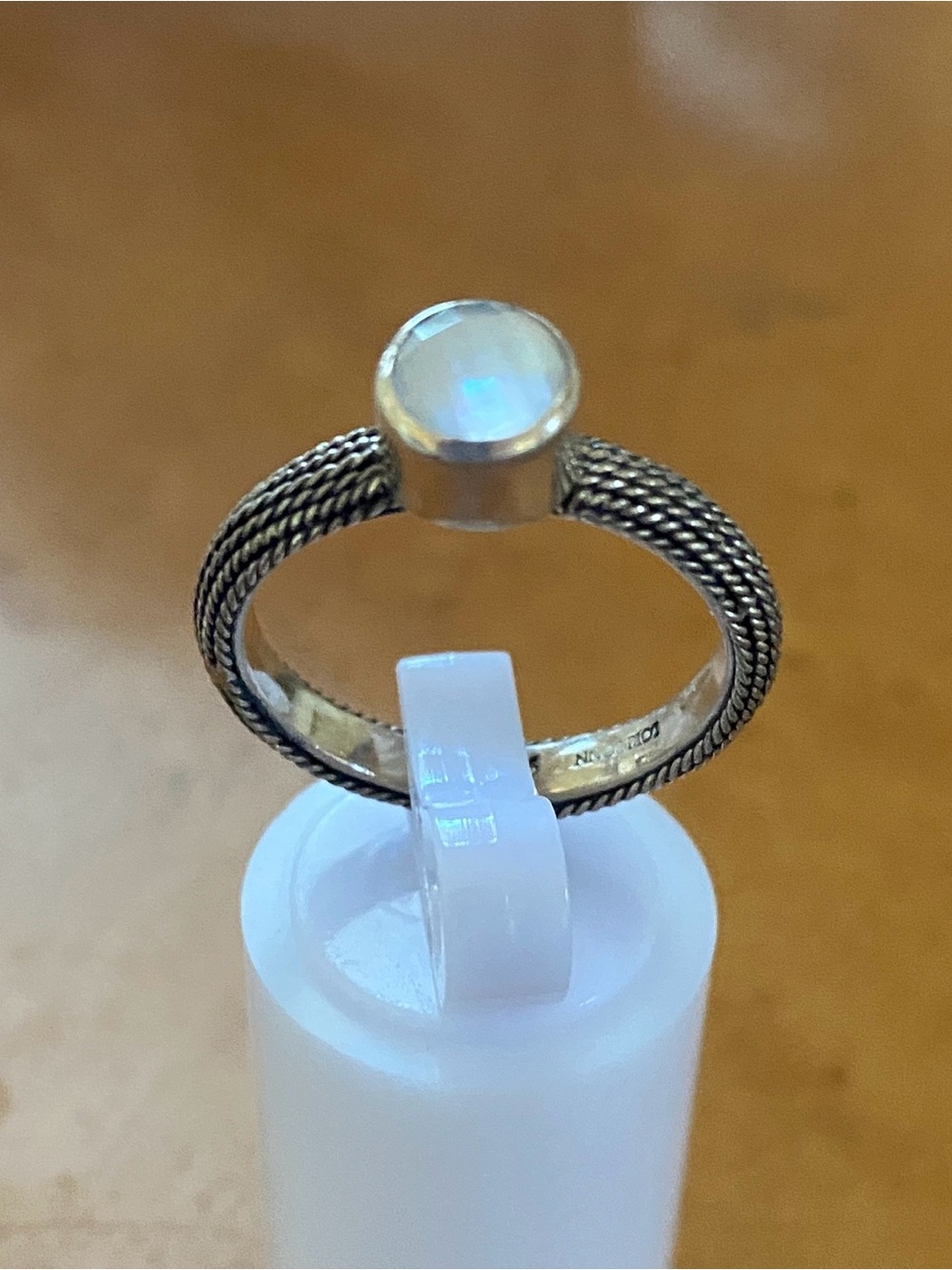 Sterling Silver Braided Band Ring with Reflective Faceted Stone
